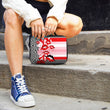 Women sitting on a step holding the Insulated lunchbox with kissable design by Studio Bilby.