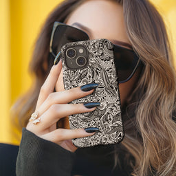 Women holding an iPhone with an 'Ocean Black' tough phone case by studio bilby.