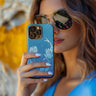Women holding the Mermaid Blue Tough Phone Case