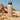 Large handle lid water bottle with ocean orange design