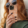Women holding the Ocean Orange Tough Phone Case