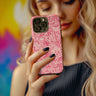 Women holding the Ocean Pink Tough Phone Case