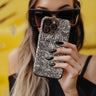 Women holding the Ocean White Tough Phone Case